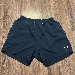 GYMSHARK dark blue men’s arrival 5 inch shorts - MEDIUM